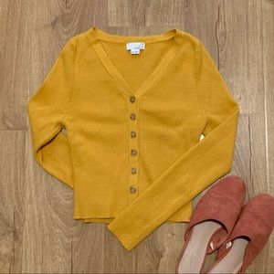 Soft golden colored cardigan